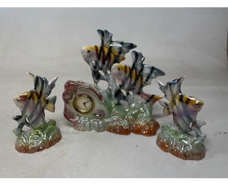 A Belgium 1950s mantel clock with garnitures in the form of a group of tropical fish, height 29cm.