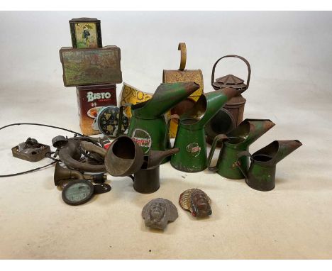 A group of metalware including a vintage road lamp, a set of 4 Castrol oil cans, pre-war van mascots, vintage tins and car re