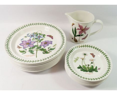 A Portmeirion dinner service comprising seven dinner plates, two side plates, six tea plates, four pudding bowls, three stora
