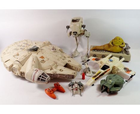 A group of vintage Kenner Star Wars play sets/vehicles including Millennium Falcon, CPG products 1979, X-wing, Kenner product