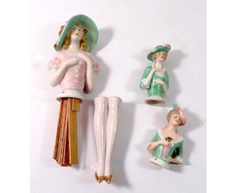 Three vintage porcelain pin dolls including one with legs 