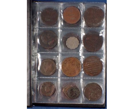 A coin album - combination of mainly copper bronze world coins, tokens and medallions 17th, 18th, 19th and 20th century inclu