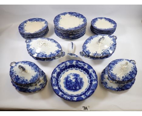An Edwardian blue and white dinner service  comprising: two covered tureens (one handle a/f), two sauce tureens (one handle a
