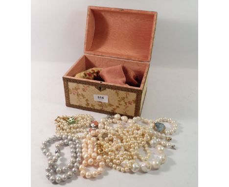 A box of faux pearl jewellery 