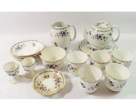 A Shelley floral part tea service comprising teapot and stand, two egg cups, five cups and seven saucers, jug, sugar bowl a/f