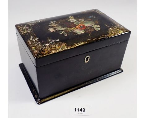 A Victorian lacquer and mother of pearl tea caddy with floral decoration, fitted two lidded caddies within, 21cm wide 