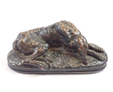 A 19th century bronze of a greyhound sleeping 14cm long 