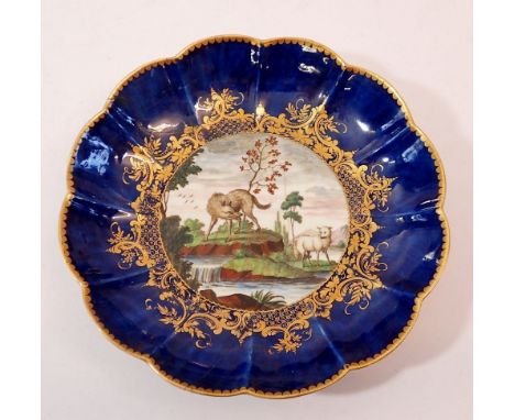 An early Worcester saucer painted by Jefferyes Hamett O'Neale depicting The Wolf and The Lamp from Aesops Fables, blue seal m