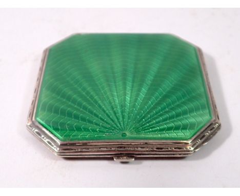 A silver and green enamel Art Deco sun ray compact, Birmingham 1935 