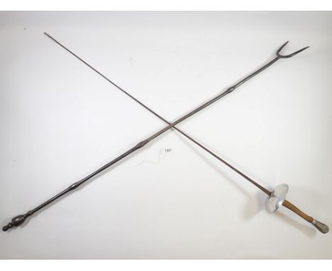 A cast iron long toasting fork 110cm long and a fencing foil 
