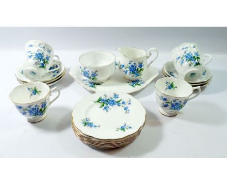 A Royal Albert Forget me Not tea service comprising six cups and saucers, six tea plates, milk, jug, sugar and cake plate 