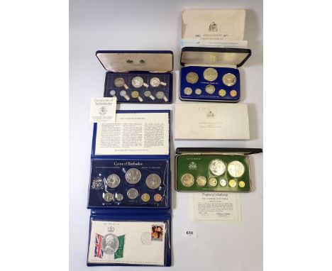 A group of five coin sets including Franklin Mint Guyana 1977 proof set, 10 dollar sterling silver, 5 dollar .500 silver, Bar