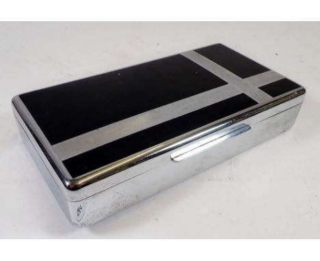 An Art Deco large chrome and black engine turned cigarette box, 24cm wide 