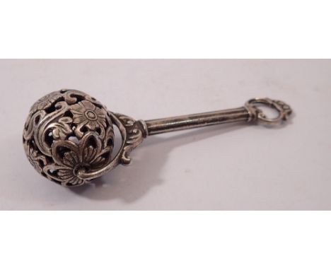 A silver plated rattle with bell to floral pierced roller 