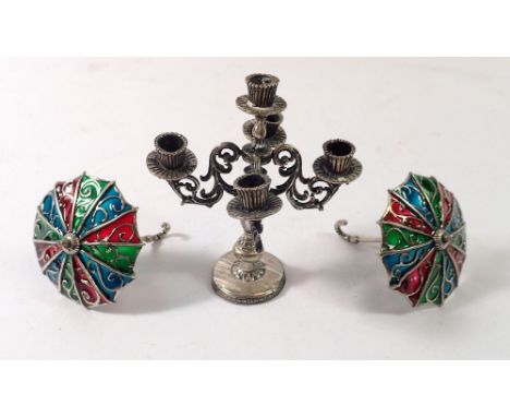 Two miniature Italian white metal and enamel umbrellas and a dolls house candleabra 7.5cm tall 