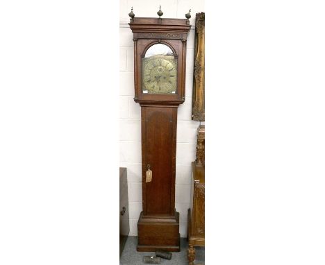 An Oak Eight Day Longcase Clock, with 13-inch arch brass dial, the arch with plaque bearing a later inscription Ed' Duncan, N