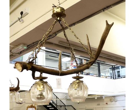 Antler Furniture: An Austro-German Antler Mounted Ceiling Light, a good quality twin light antler mounted light fitting, with