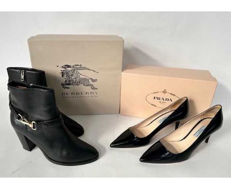 Pair of Burberry Black Leather Heeled Ankle Boots with a 3 inch heel (size 40),together with a pair of Prada Black Leather St