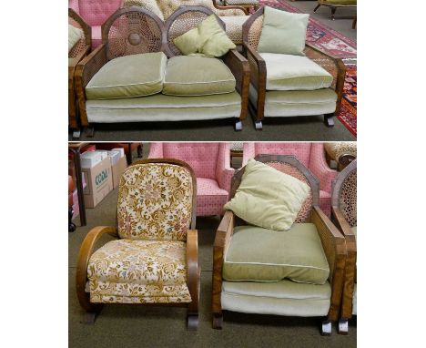 An Art Deco Oak and Mahogany Bergere Three Piece Suite, in green upholstery, comprising, two seat sofa and a pair of armchair