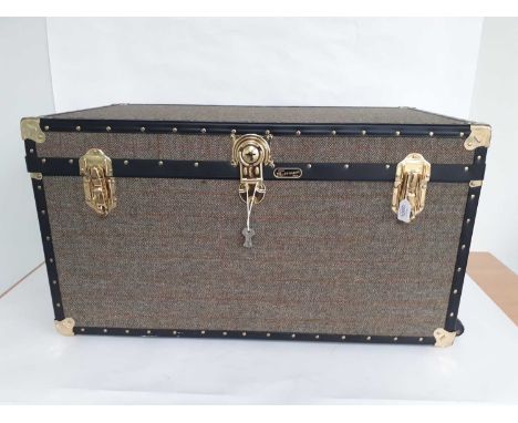 Mossman Harris Tweed Large Rolling Trunk with hinged lid , black and gold trims, flip lock and keys, wheels to one end and a 