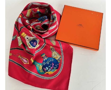 Hermès Silk Scarf Qu'Importe Le Flacon Pourvu Qu'on Ait L'Ivresse Designed by Catherine Baschet, depicting an assortment of s