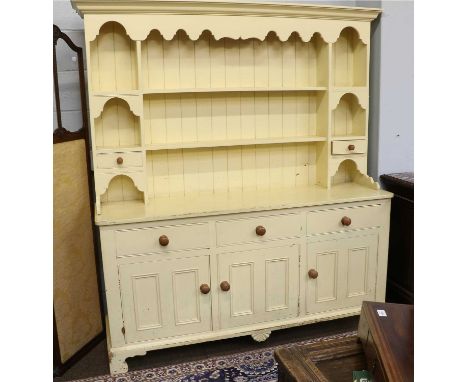 A 20th Century Painted Pine Farmhouse Dresser, with enclosed rack, incorporating spice drawers with three drawers and panelle