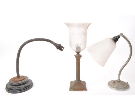 Three vintage early 20th-century table lamps, including a lamp with an adjustable arm with a ceramic base, a lamp with a Vict