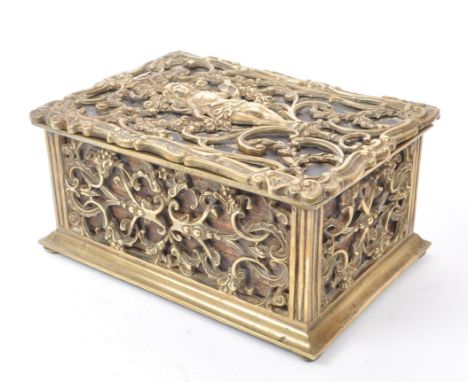 A wooden and lead lined tea caddy cased in a brass decorative fixture. Pattern depicting a woman in a floral setting.19th cen