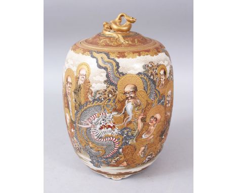 A JAPANESE MEIJI PERIOD SATSUMA LIDDED VASE, the body decorated with immortals, the lid with a moulded snake finial, 24.5cm h