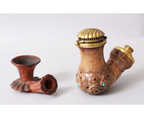 A FINE LARGE OTTOMAN TURQUOISE AND OTHER STONES INSET SMOKING PIPE and another clay one.
