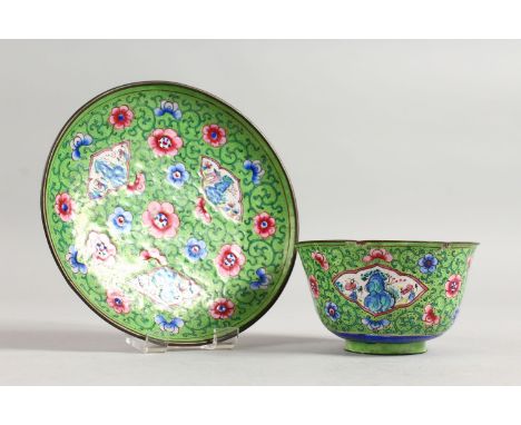A CANTON ENAMEL TEA BOWL AND SAUCER.