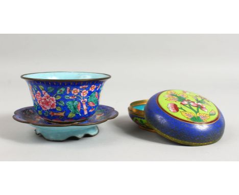 A BLUE CLOISONNE ENAMEL BOX AND COVER, 4ins diameter and a BLUE ENAMEL BOWL AND STAND (3).