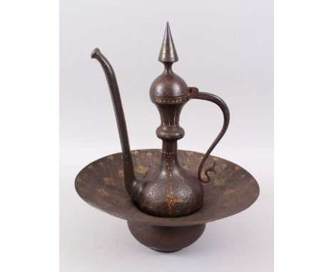 A 19TH CENTURY PERSIAN QAJAR GOLD INLAID STEEL EWER AND CIRCULAR BASIN, 38cm high overall, 30cm diameter.