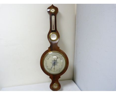 Rosewood wheel barometer with silvered scale Hydrometer thermometer mirror and level.