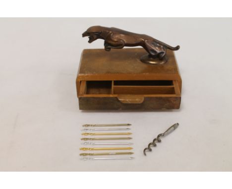 1950's Jaguar car mascot corkscrew bottle opener, the removable copper handle on walnut veneered base with drawer containing 