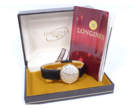 Gents Longines 9ct gold watch, manual in 9ct gold, inscribed, 1973, with tag leaflet and box.   Condition Report.  Longines R