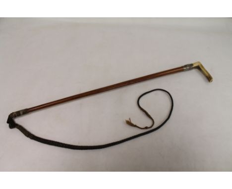 Victorian or Edwardian huntsman's whip with horn handle, white metal ferrule decorated with hounds, cane shaft and plaited le