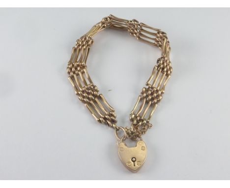 Gold gate bracelet, 9ct padlock, 1909. Condition Report. 13g
