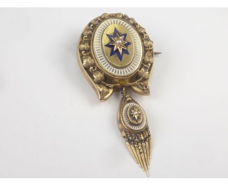 Victorian gold pendant of horse shoe shape with enamel and pearl, with tassel. Condition Report. 15g gross