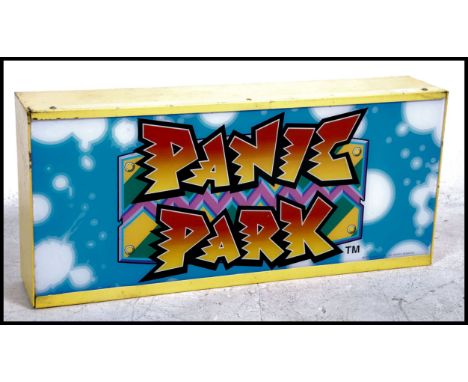 A retro 1197 Namco Arcade machine top mounted game light for ' Panic Park ' Yellow metal case with glass facia. Marked to the