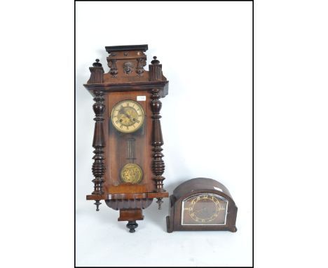 A 19th century walnut vienna regulator wall clock in the manner of Gustav Becker with brass pendulum together with a 1930's d
