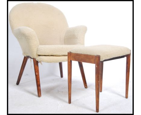 A vintage mid century ' Meredew ' faux woollen upholstered wooden chair together with the matching footstool.&nbsp;Measures h