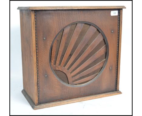A 1930's oak Art Deco gramaphone - radiogram speaker having sunburst facia