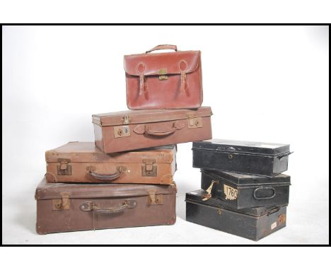 A collection of 3 vintage ebonised metal deed boxes together with 2 vintage suitcases and a gentleman's leather attache case.