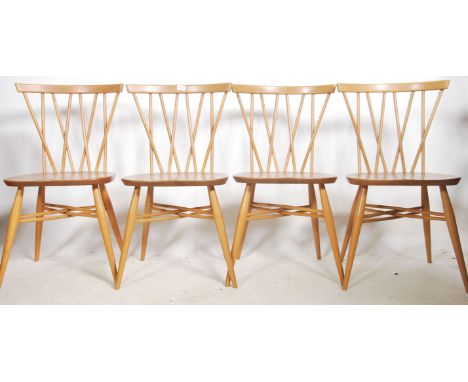 A set of four fantastic vintage &nbsp;mid 20th Century Ercol Windsor beech and elm cross back candlestick dining chairs, soli