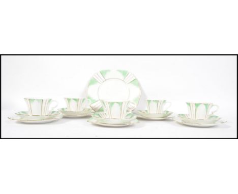 A Royal Albert Art Deco part tea service consisting of cups, saucers, side plates, sandwich plate etc.