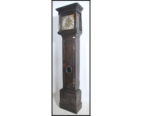 An 18th / 19th century Thomas Cox of Thornbury, Bristol brass faced longcase clock set within country pine trunk and hood wit