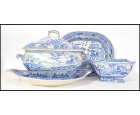 A group of 19th century blue and white ceramics to include a large lidded tureen with serving spoon and tray with a matching 