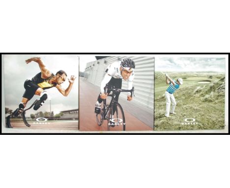 A group of three advertising canvas prints for Oakley. Each print having a different sports star on to include Mark Cavendish