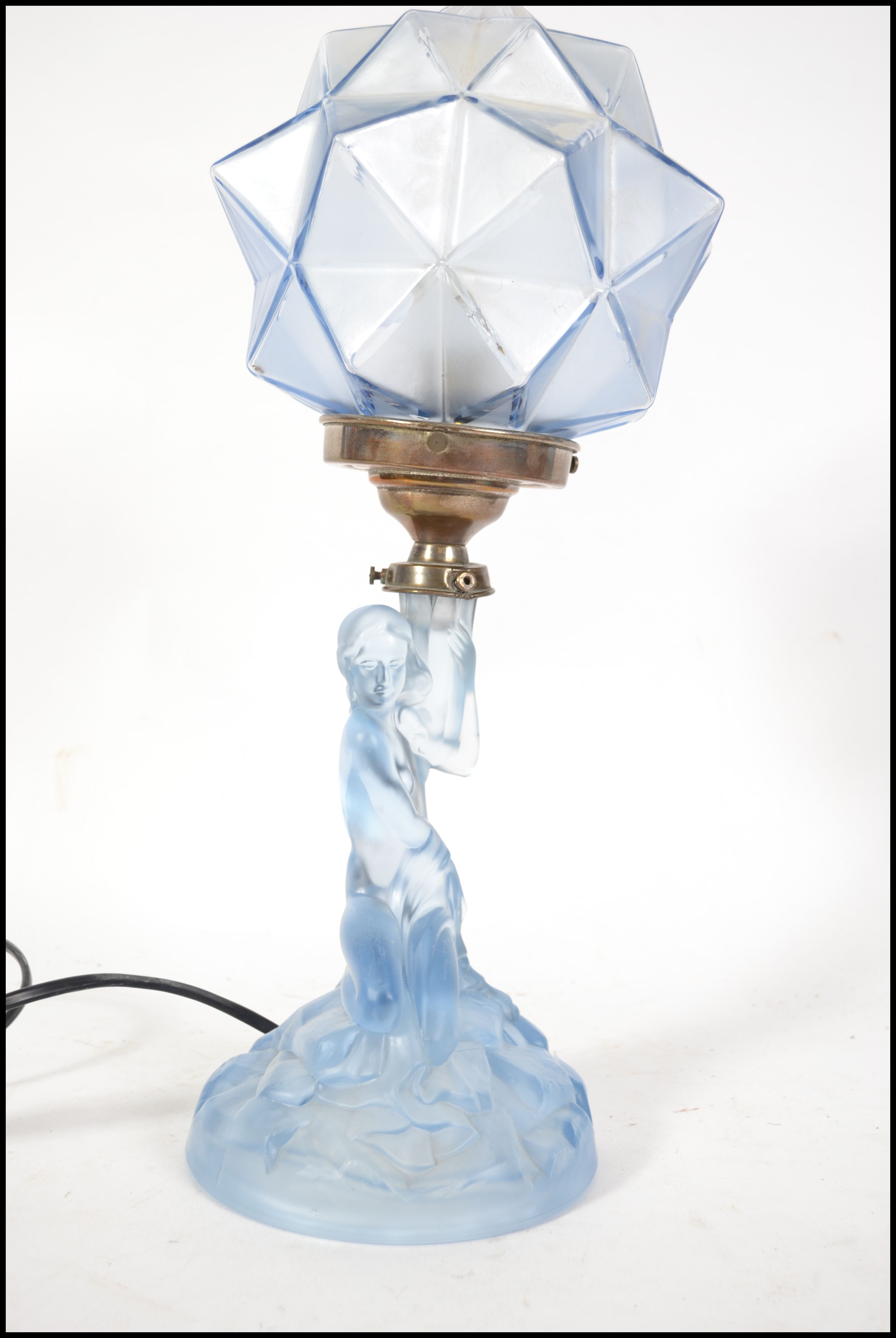 A vintage Art Deco blue frosted glass table lamp in the form of a lady